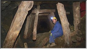 Timbered level leads to stables in El Lirio mine
