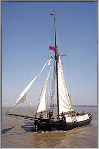 The Spry under sail on the River Severn