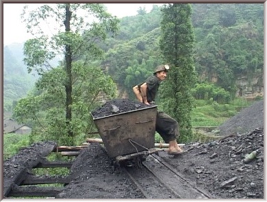 Man powered working on the dual gauge 300mm and 600mm mine system at Huangcun